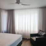 Sheer Curtains with Blockout Curtains — iQ Shutters in Warana QLD
