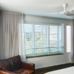 Shutters with Blockout Curtains — iQ Shutters in Warana QLD