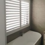 Bathroom Plantation Shutters — iQ Shutters in Warana QLD